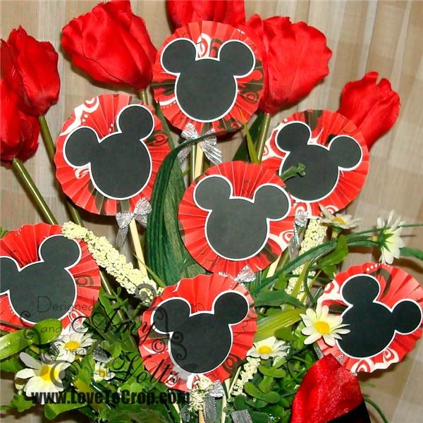 I decided to add some Mickey flower rosettes to make this an even happier 