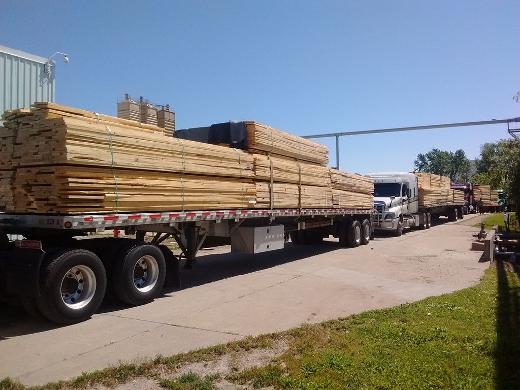 flatbed loaded with Lumber from Bennett Lumber in Princeton, ID being delivering to Pella Windows & Doors in Pella, IA flatbed loaded with Lumber from Bennett Lumber in Princeton, ID being delivering to Pella Windows & Doors in Pella, IA